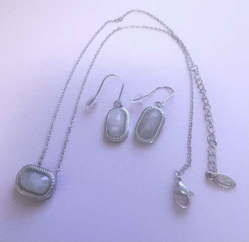 Matching necklace and earrings - and,