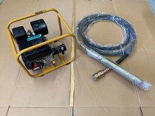 CONCRETE VIBRATING POKER petrol poker unit and 1 X  6mtr pokers new