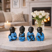 4 Sitting Mini Buddhas