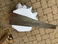 vintage crosscut saw. hardwood handle