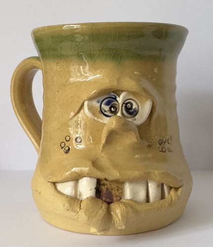 Pretty ugly hand thrown - hand,