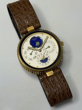 Gerald Genta Watch 18k Gold Safari Tri-Date Moonphase Ref 2940.4 Quartz 33.5mm
