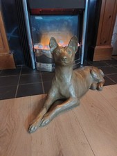 Full size, relaxing Basenji