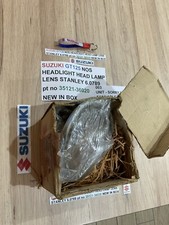 SUZUKI GT125 NOS HEADLIGHT