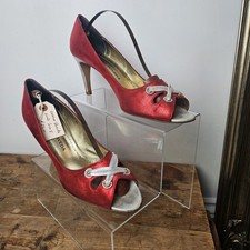 Carmen Poveda metallic red &