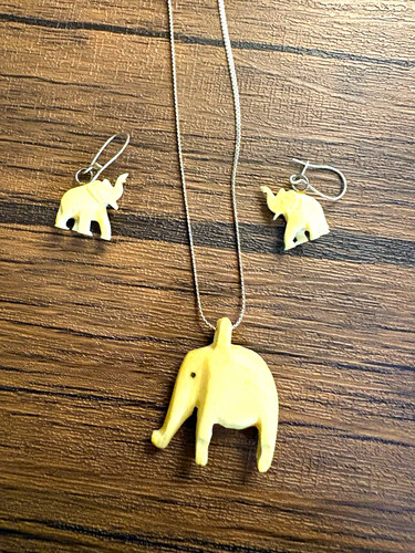 Ivory plastic elephant - plastic,