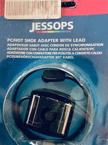 Hot shoe adaptor with - hot,