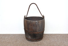 old vintage wooden rice bucket