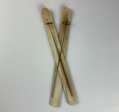 Wooden skis and poles hanging - skis,