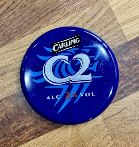 Carling lager flat round - lager,