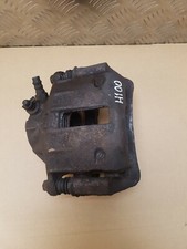 Hyundai H100 front brake caliper off driver right side 1997 1998 1999 2000 van