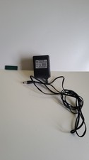 9V 500MA AC/DC  POWER SUPPLY