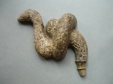 Thames find, near Tower of London. Snake pendant. Roman cult? Possibly Isis. 