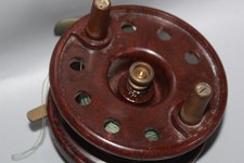VINTAGE MOTTLED BROWN BAKELITE TROTTING FISHING REEL WITH CHECK 4" DIAMETER