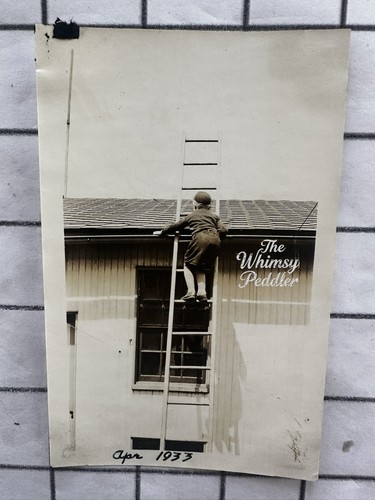1933 child climbing ladder - climbing,