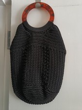 Small black knitted handbag
