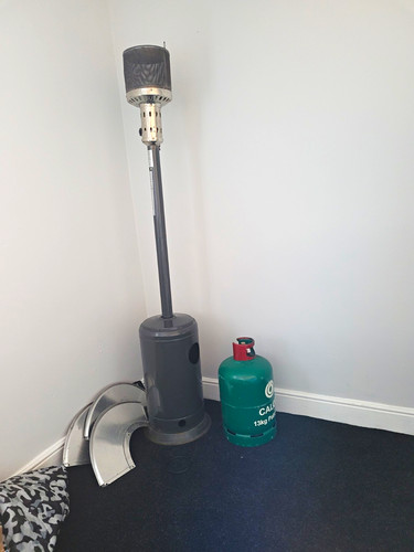 Black standing gas flame - flame, patio
