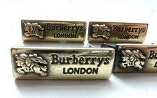 Vintage Burberrys metal tag