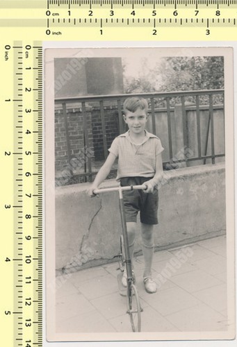 Boy with vintage scooter ride - vintage,