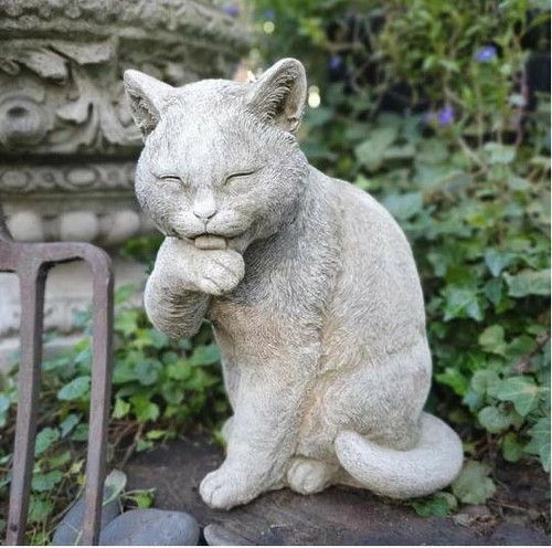 Preening cat statue - preening,