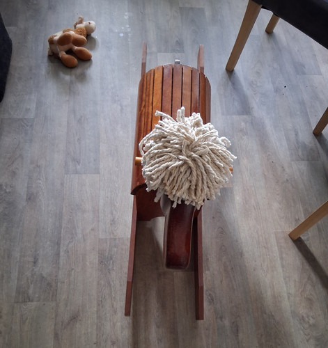 Wooden rocking horse with - with, yarn