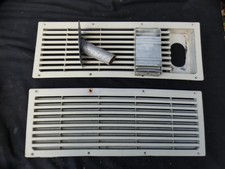 Pair of Electrolux Caravan  fridge vents with flu vent.