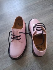 Dr. Martens pink patent shoes