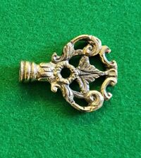 Small brass key bow lock metal