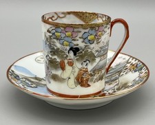 Kutani Meiji porcelain tea cup and saucer Japanese hand painted landscape scene