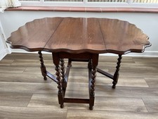 Drop-leaf antique wooden