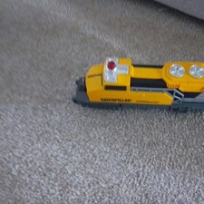 CAT.TRAIN CONSTRUCTION SET. EXPRESS TRAIN.LOCOMOTIVES.CATTERPILLAR.DOZER.DUMPER