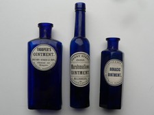   genuine old bottle group of 3  with  geuine old chemist labels added  
