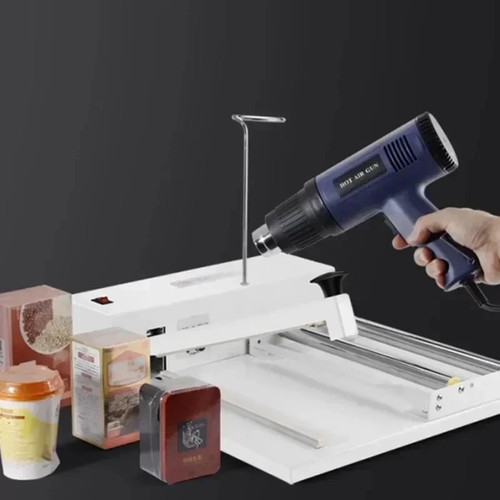 Shrink wrapping machine with - shrink,