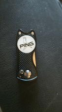 Black metal golf pitchmark