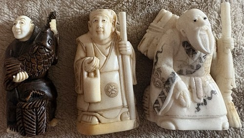 Four netsuke hand - four,