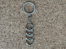 Audi Rings logo Metal  keyring/keychain  in chrome . Price includes postage