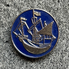 SILVER TONE GALLEON ON BLUE