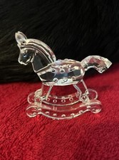A STUNNING SWAROVSKI ROCKING