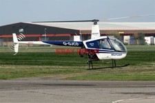 PHOTO  G-GJCD ROBINSON R22 HELIFLIGHT COVENTRY AIRPORT 02-04-2009