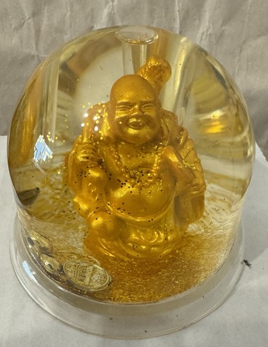 Laughing buddha encased a - ,