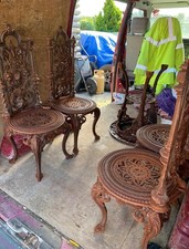 Heavy & ornate antique cast iron garden table and 4 chairs