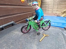 TINPLATE CLOCKWORK MAN ON CYCLE WITH KEY