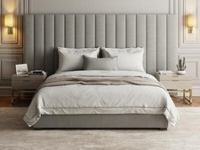 Panelled bed frame wall