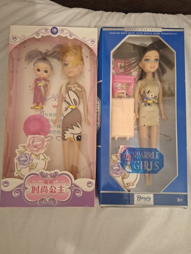 Two dolls the beauty - two,
