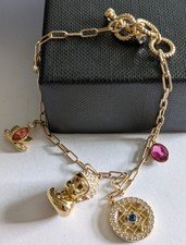 Swarovski budda/ crystal charm gold tone bracelet