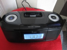A ILUV FM DIGITAL RADIO/ALARM CLOCK WITH DOCKING SYSTEM. WORKS GREAT!