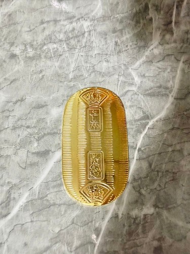 Vintage gold coin - small, oval