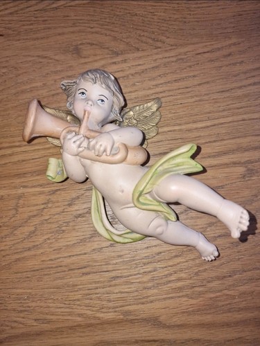 Cherub wall figuerine - wall,