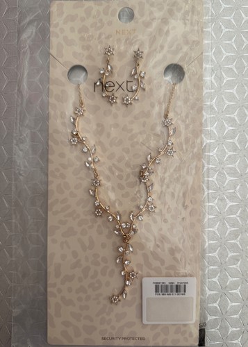 Next gold tone - leaf, y
