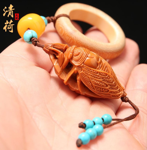Olive nut hand carved cicada - nut,